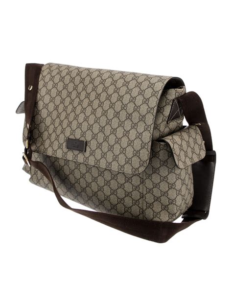 gucci gg supreme wolf print diaper bag brown|gucci monogram diaper bag pink.